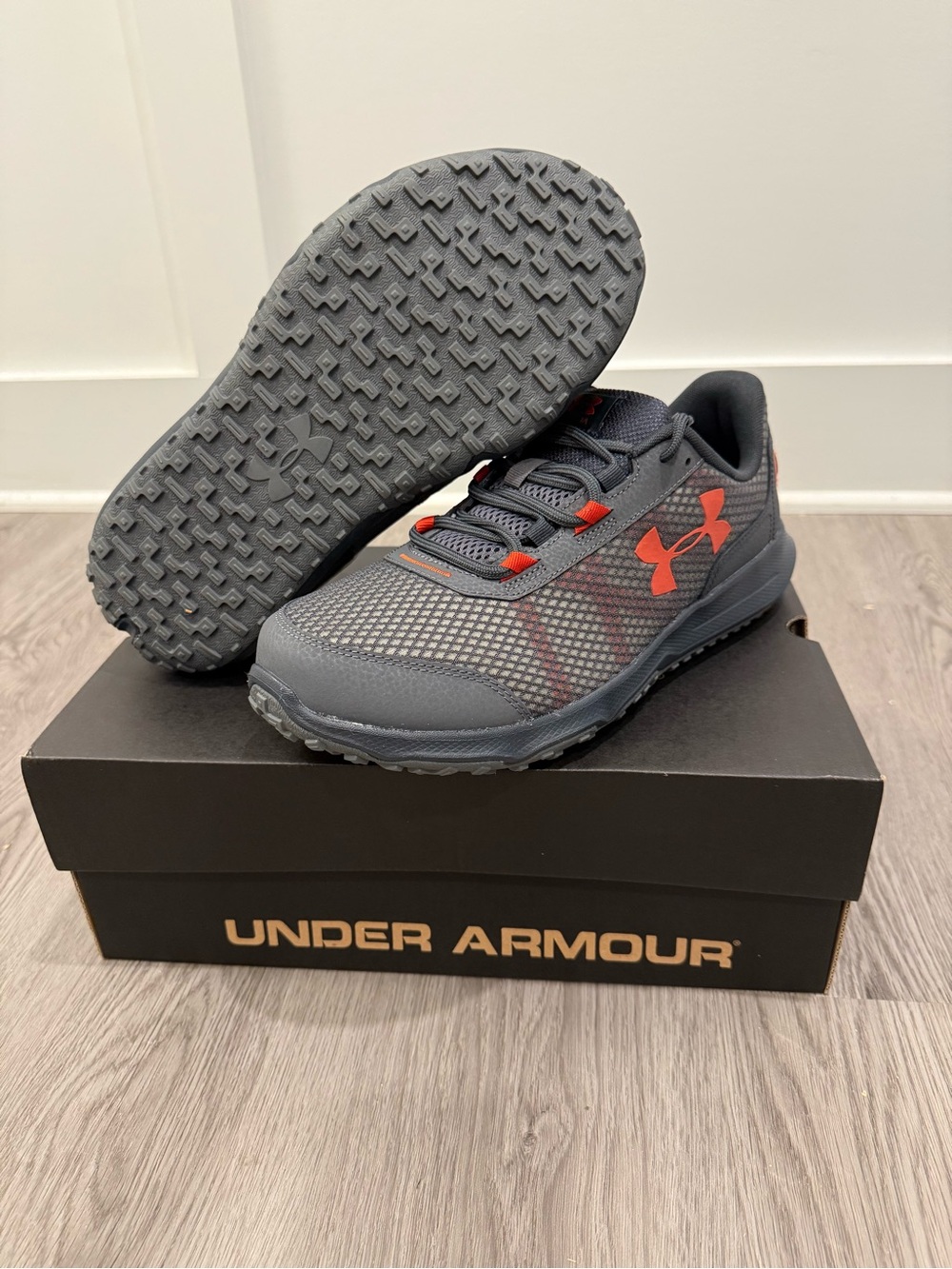 Under Armour Men’s Dark Gray Athletic Sneakers with Orange Accents